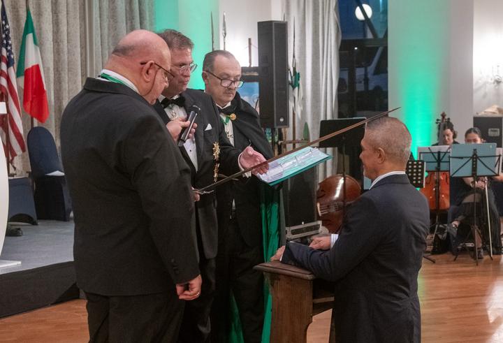 Chevalier Radoy Koynov receives the accolade.