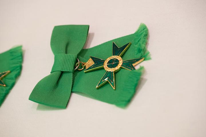 The cross of a Knight of Grace.