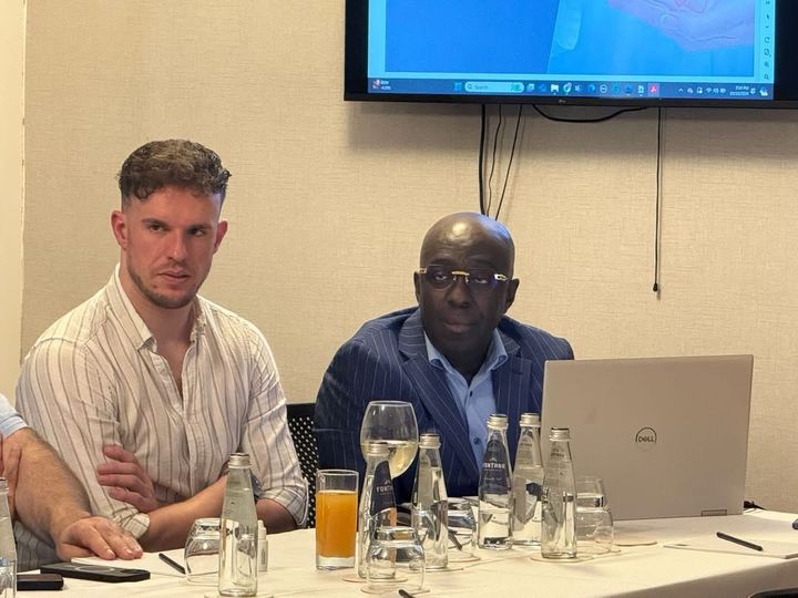 Dr Christopher Otiko (right) during the presentation.