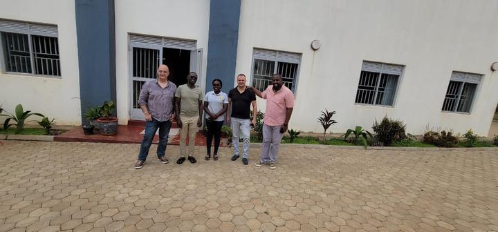 From left: Chevalier Svetoslav Boyadzhiev KLJ, Grand Prior of Bulgaria; Sam Wambayo, Executive Director and Co-Founder of Kids Club Kampala; a member of the home's staff; Chevalier Dr Johann Debono KCLJ CMLJ; Andrew Nyanja.