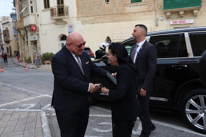 The Grand Chancellor, H.E. Massimo J. Ellul, welcomes the President of Malta.